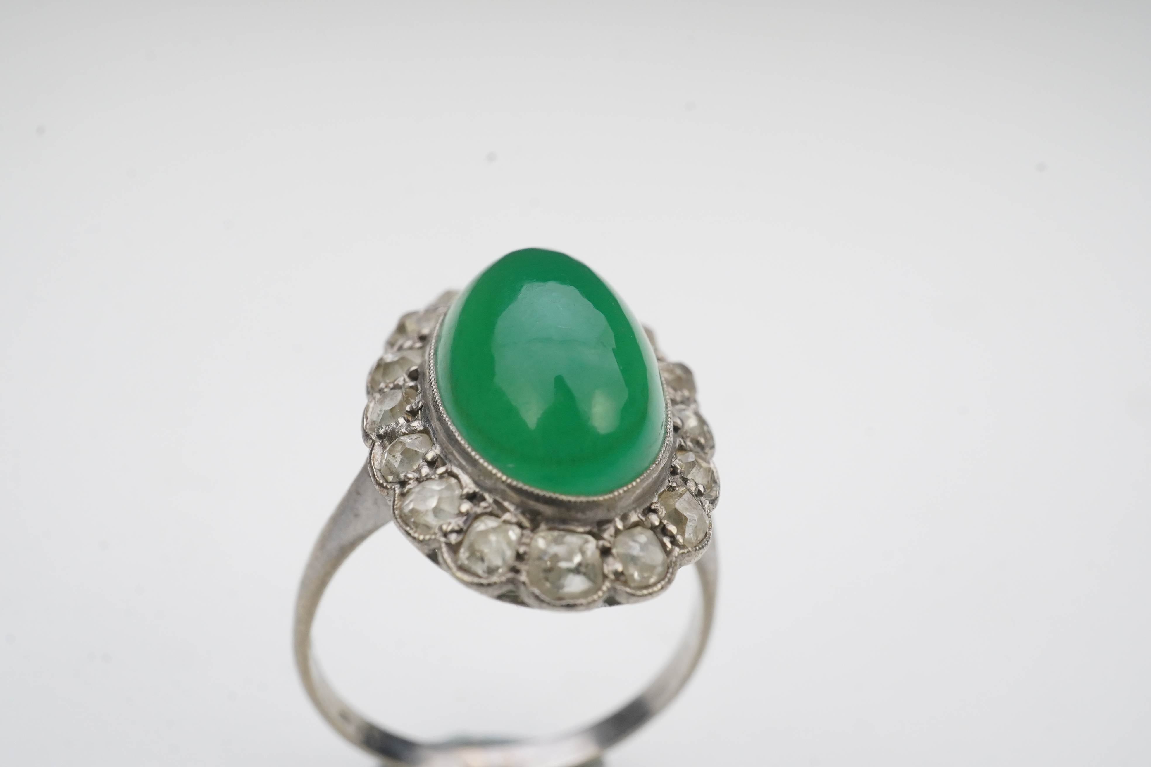 A green chalcedony and diamond ring, early 20th century